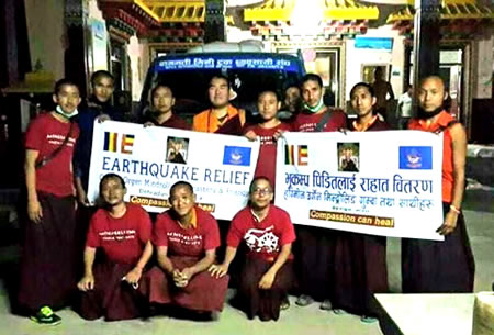 Monks gather for a photo before departing to earthquake area.